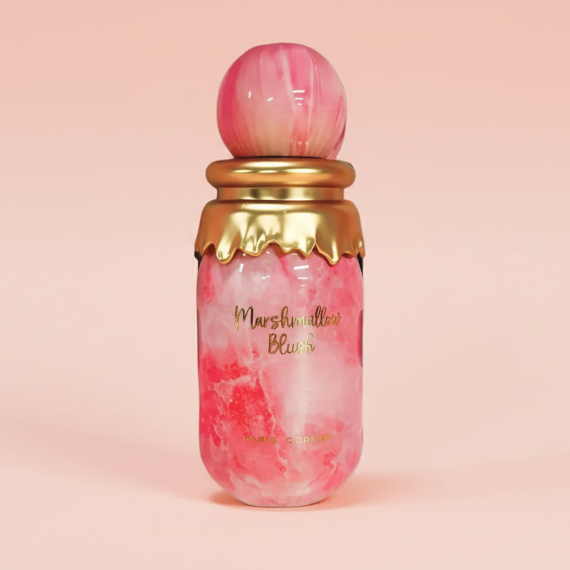 Pink and gold perfume bottle with 'Marshmallow Blush' text on a white background