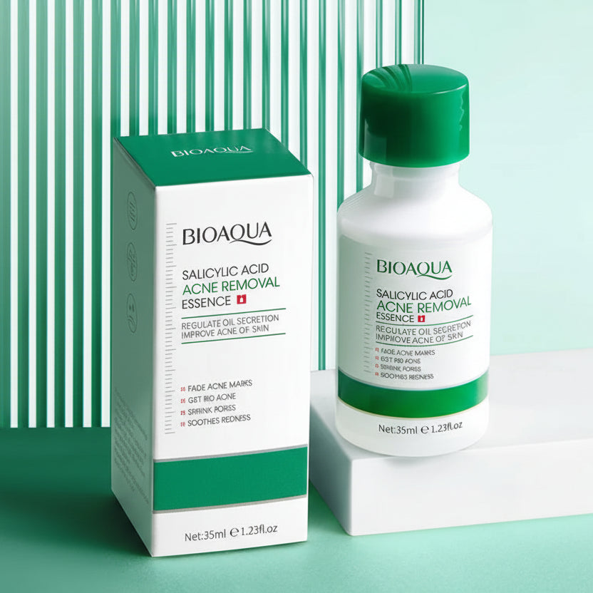 Bioaqua Salicylic Acid Acne Removal Essence bottle and packaging on a green background
