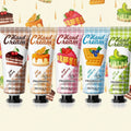 Set of Bioaqua hand cream with colorful packaging and a pink box in the background.