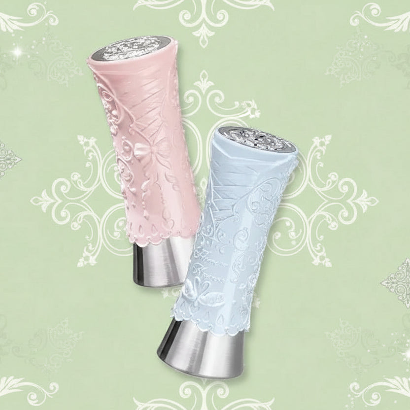 Two lace-covered umbrellas on metallic stands against a white background