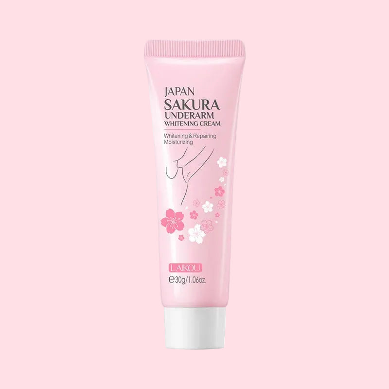 Pink tube of Japan Sakura underarm whitening cream on a white background