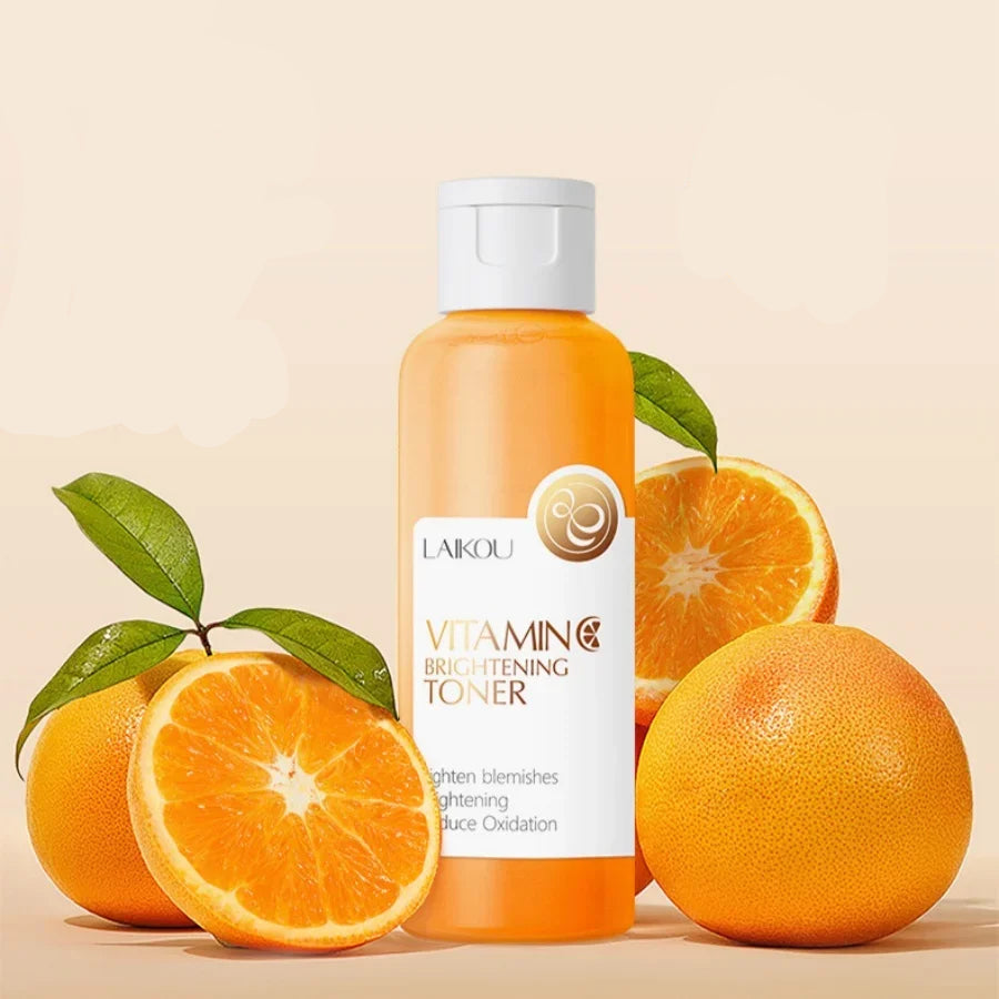 Laikou Vitamin C Brightening Toner with oranges on a beige background