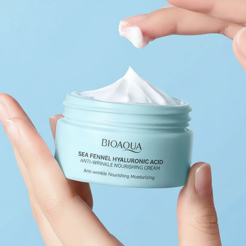 BIOAQUA cream jar held by a hand with product features displayed below on a blue background