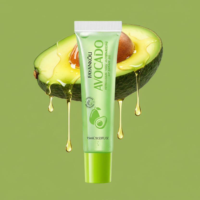 Avocado-themed lip repair oil with green packaging on a white background