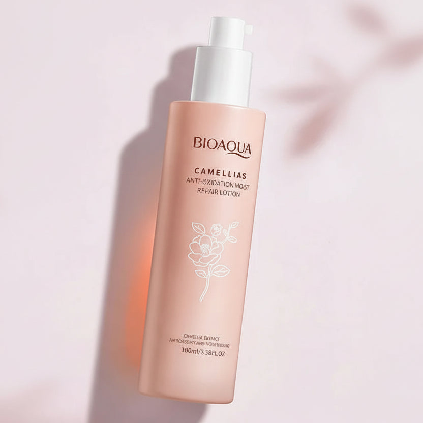 Bioaqua Camellias repair lotion with three labeled cards on a pink background