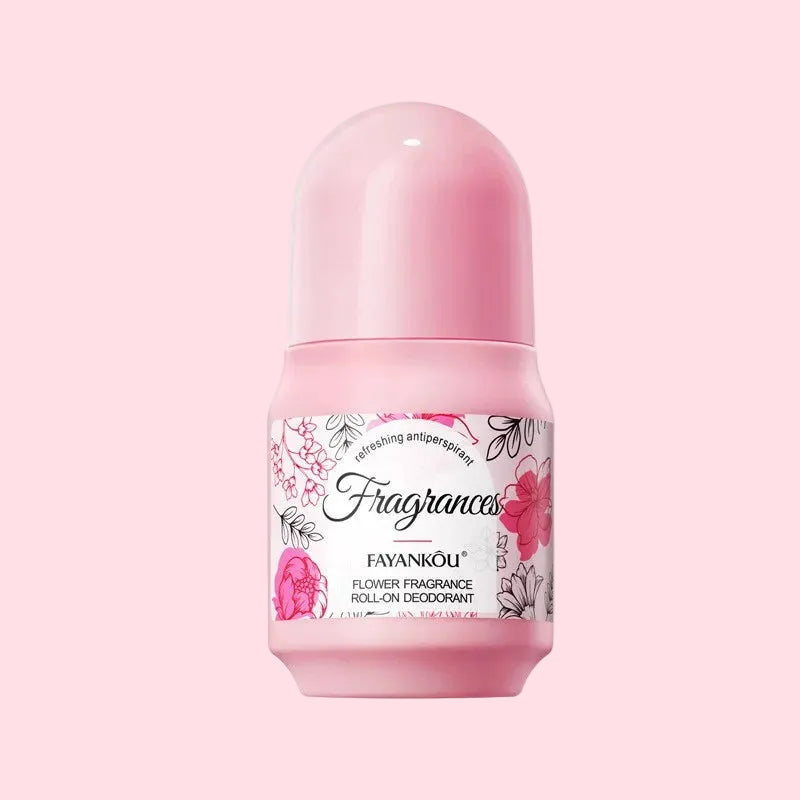 Pink roll-on deodorant with floral design on a white background