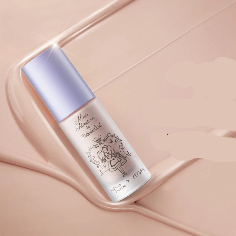 Skincare bottle with a decorative label on a pink background