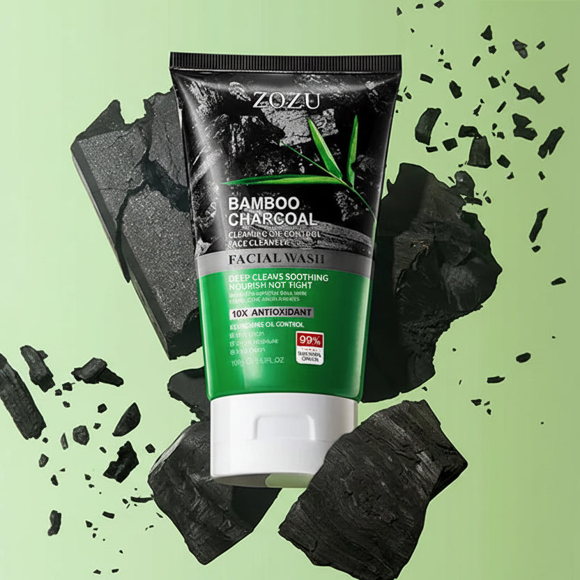 ZOZU Bamboo Charcoal face wash tube with charcoal pieces and skin before and after use on a green background